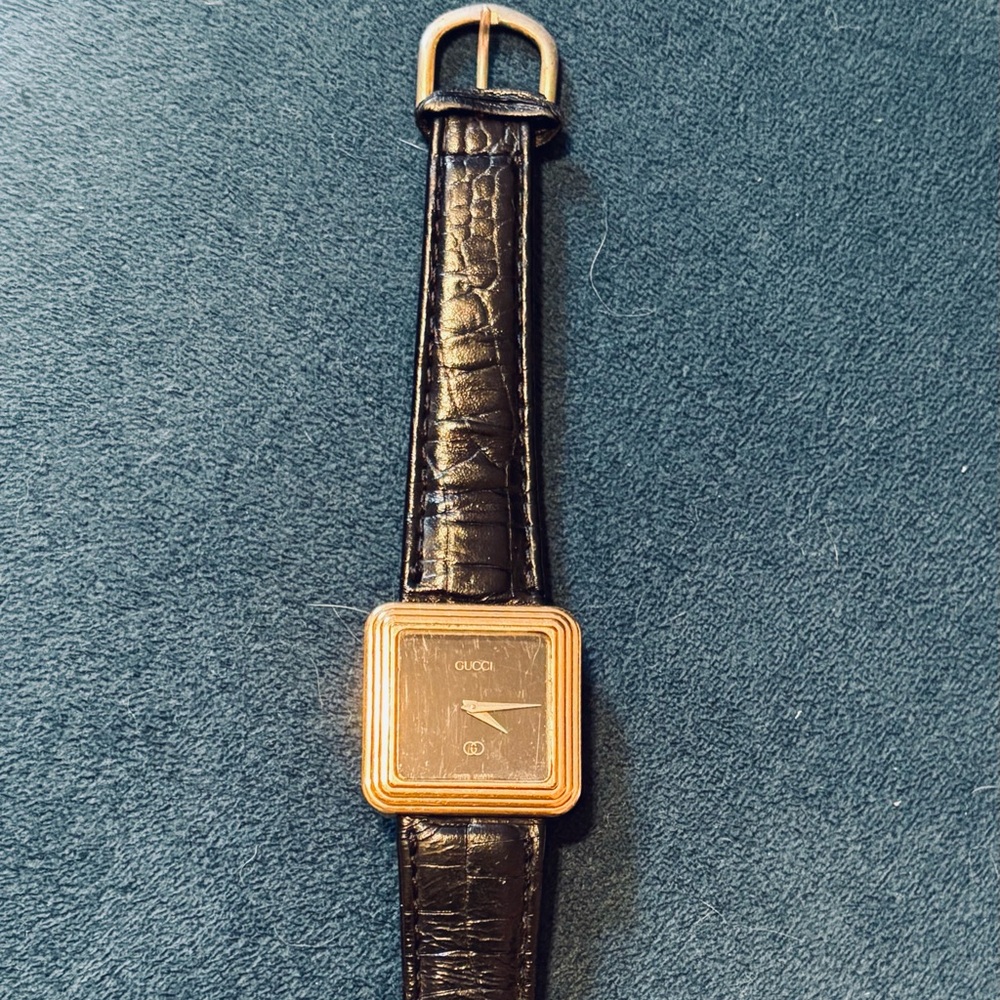 Vintage Gucci Black and Gold Leather Watch
